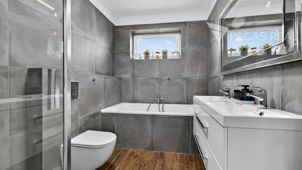 Na predaj moderný 4-izb. samostatne stojaci bungalov s krásnou záhradou a bazénom v Kalinkove