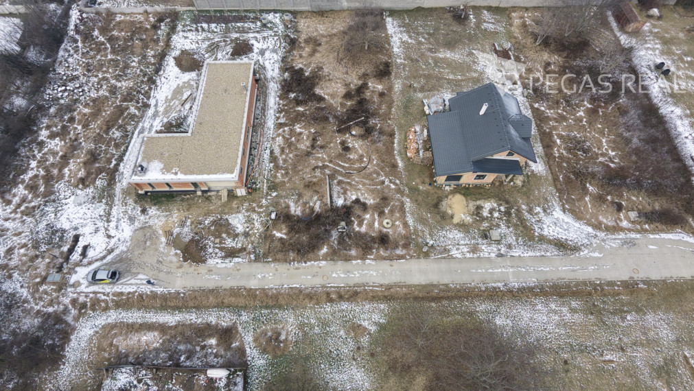 Stavebný pozemok s projektom (1271 m²) vo Veľkom Bieli